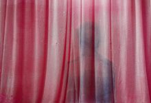 "Behind the curtain"